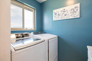 Laundry room with separate washer and dryer