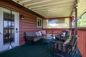 View of patio with an outdoor living space