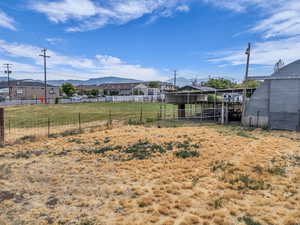 View of yard featuring a mountain view and a residential view