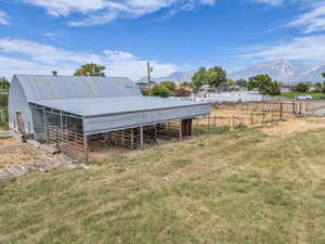 View of outbuilding with an exterior structure and a mountain view