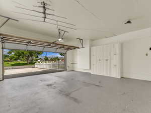 Garage featuring a garage door opener