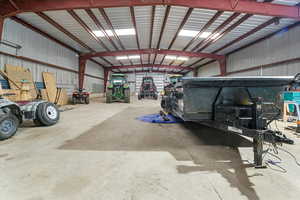 Garage featuring metal wall