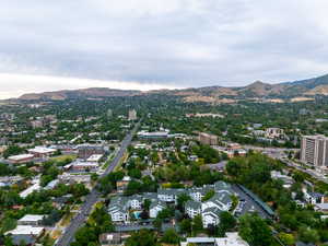 Aerial overview of property's location with a mountainous background