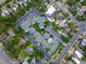 Aerial view of property's location with nearby suburban area