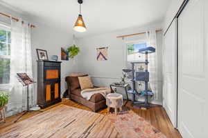 Sitting room featuring wood finished floors