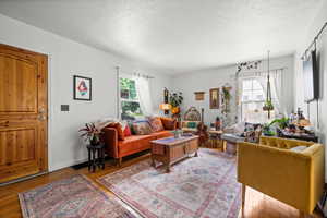 Living area with light wood-type flooring