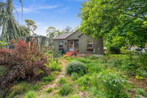 View of front of property featuring stucco siding