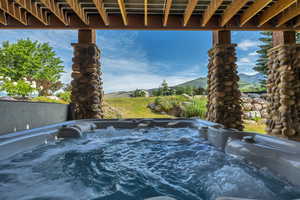 Exterior view of mountains and a hot tub
