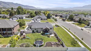 Aerial perspective of suburban area featuring mountains