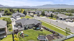 Aerial view of residential area featuring mountains
