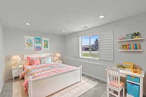 Carpeted bedroom with baseboards and recessed lightingPhoto virtually staged