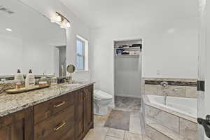 Ensuite Full bath with vanity and a garden tub