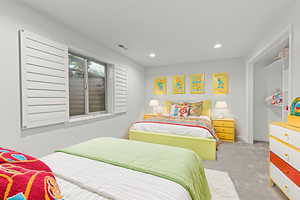 Bedroom with carpet flooring and recessed lightingPhoto virtually staged