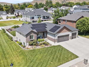 Aerial perspective of suburban area with a mountain backdrop