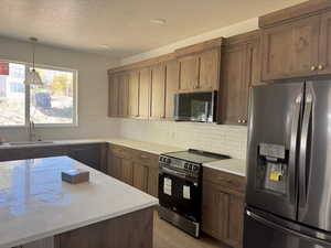 Lot 9 - Kitchen, black stainless appliance package included.