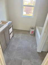 Full bathroom with vanity