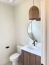 Bathroom with vanity and light tile patterned floors