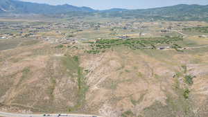 Aerial overview of property's location with mountains and rural landscape
