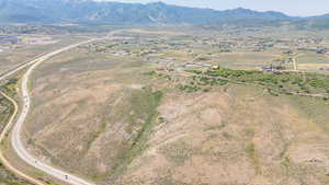 View of property location featuring mountains and rural landscape