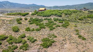View of mountain background featuring rural landscape