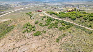 Aerial view of sparsely populated area with a mountain backdrop