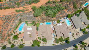 Aerial view of property's location with a pool