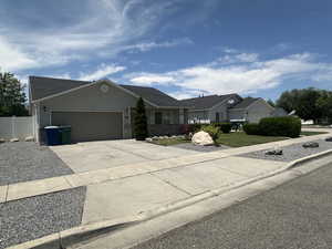 Single story home with an attached garage and driveway