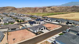 Aerial view of residential area with a mountain backdrop