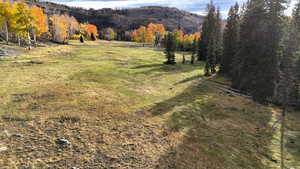 View of mountain backdrop featuring rural landscape