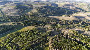 Aerial overview of property's location featuring property boundaries highlighted