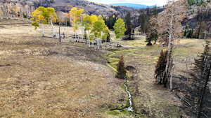 View of mountain background featuring rural landscape