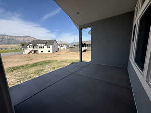 View of patio / terrace with a mountain view and a residential view