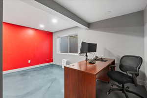 Office with recessed lighting and finished concrete floors