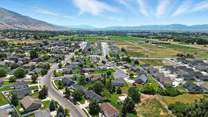 View of property location featuring a mountain backdrop and nearby suburban area