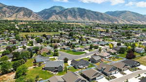 View of property location with nearby suburban area and a mountainous background
