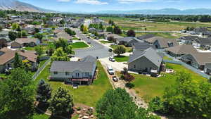 Aerial view of residential area featuring a mountain backdrop
