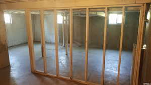 Basement featuring plenty of natural light