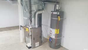 Utilities featuring water heater and heating unit