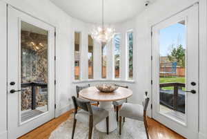 Dining room featuring a chandelier and wood finished floors