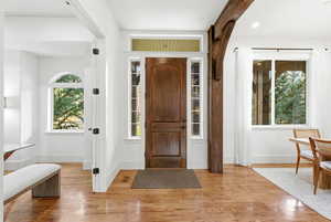 Entrance foyer featuring light wood-type flooring