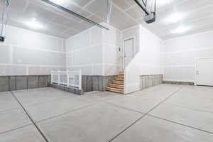 Garage featuring a garage door opener