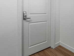 Workshop w/bench, cabinets & combination-lock VAULT door to SECURE room