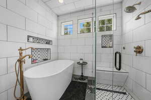 Separate soaking tub & shower w/steam