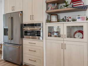 Top-of-the line ZLine frig + display cabinetry