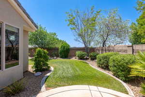 View of fenced backyard