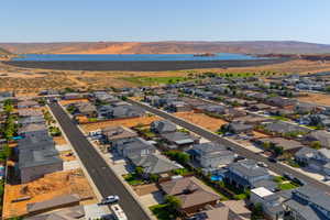 Aerial view of residential area featuring a water and mountain view
