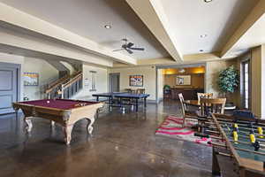 Game room with finished concrete floors, billiards, ceiling fan, and recessed lighting