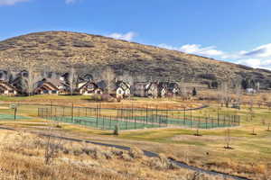 View of swimming pool featuring a mountain view and a residential view