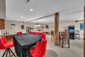 Game room featuring recessed lighting, bar with sink, and billiards table
