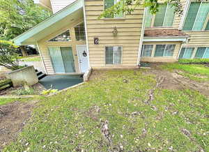 Entrance to property with a patio area